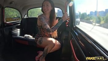 Fake Taxi Tattooed babe seduces the taxi driver by showing off her tattooed body