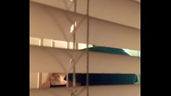 Voyeur Caught them fucking in the bathroom while h. up Christmas lights